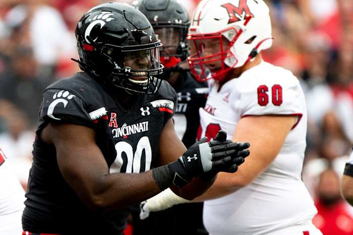 Cincinnati Bearcats linebacker Jabari Taylor (0) celebrates after forcing a rushed throw in the second half of the NCAA football game on Saturday, Sept. 4, 2021, at Nippert Stadium in Cincinnati. Cincinnati Bearcats defeated Miami Redhawks 49-14. Cincinnati Bearcats Miami Redhawks
